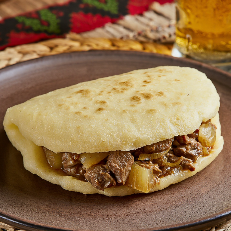 Arepa Kiwi: Cordero y Kumara al Estilo Hangi
